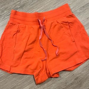 Bring orange running shorts